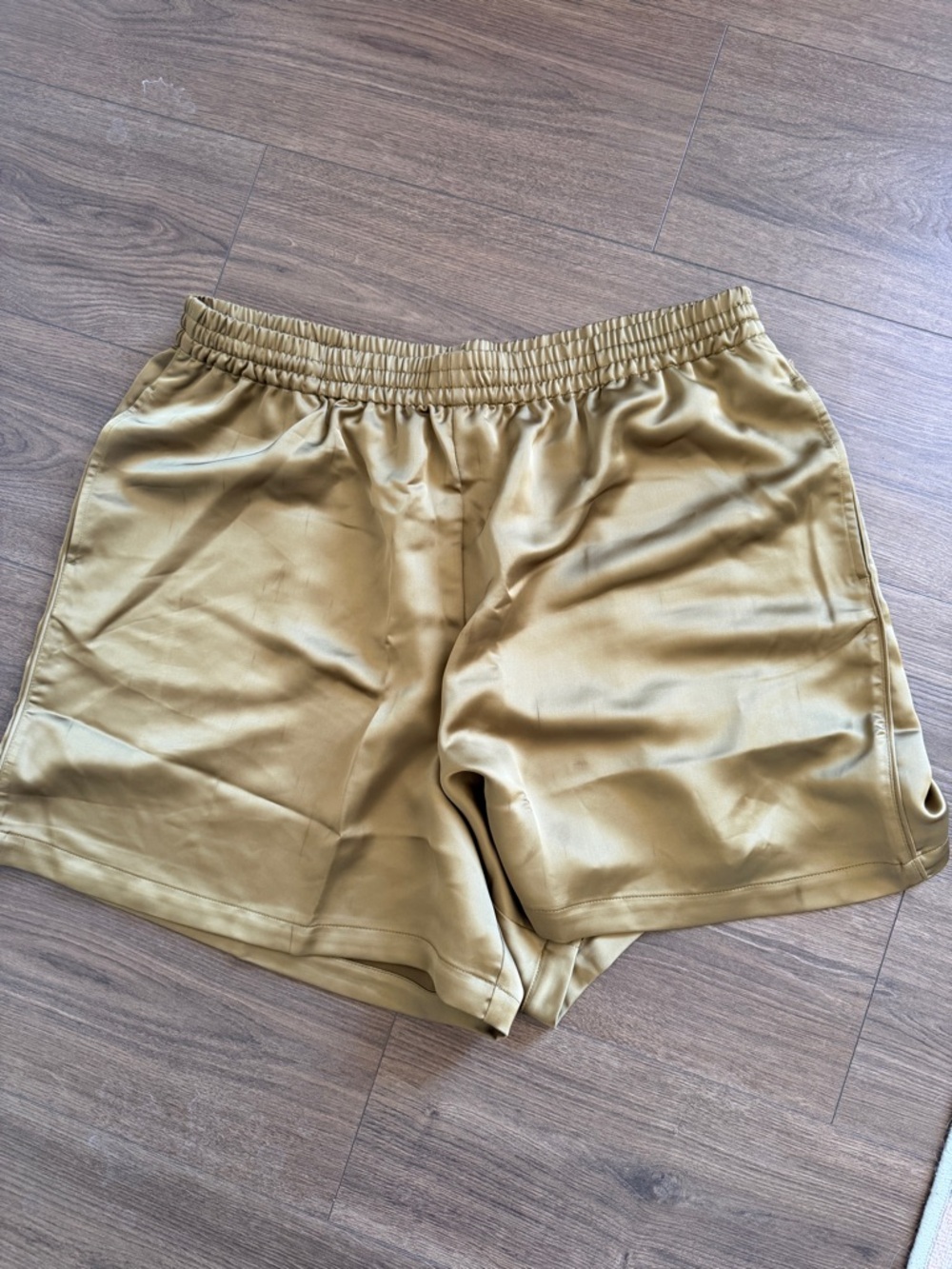 SKIMS Satin Athletic Shorts in Gold - Picture 3 of 6